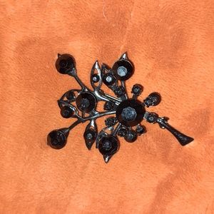 Black stone broach